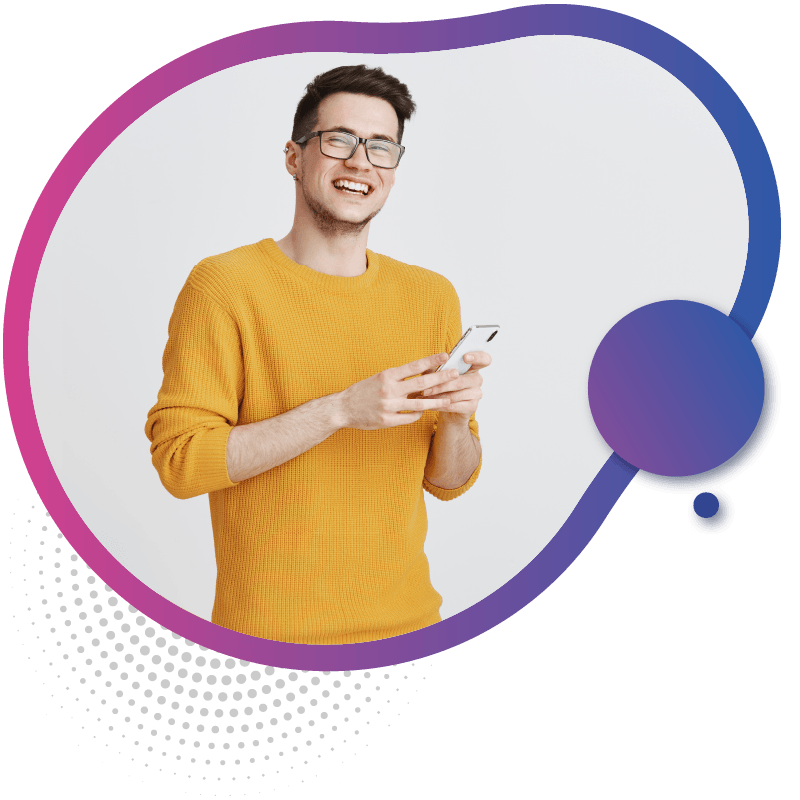 A person in a bright yellow sweater holds a smartphone with both hands, symbolizing the convenience and connectivity of eSIM technology in Australia