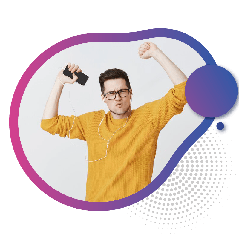A person in a bright yellow sweater enthusiastically raises a smartphone while listening to music, embodying joy and excitement, symbolizing the future of mobile connectivity with eSIM technology in Australia.